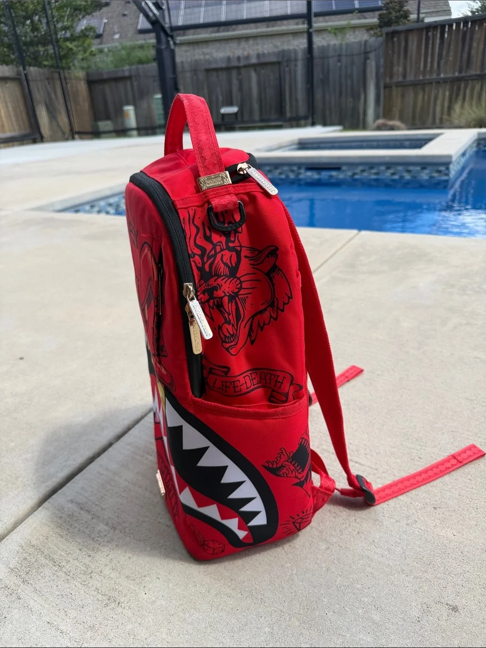 Sprayground Red Graphic Backpack - Gummy Monster Design